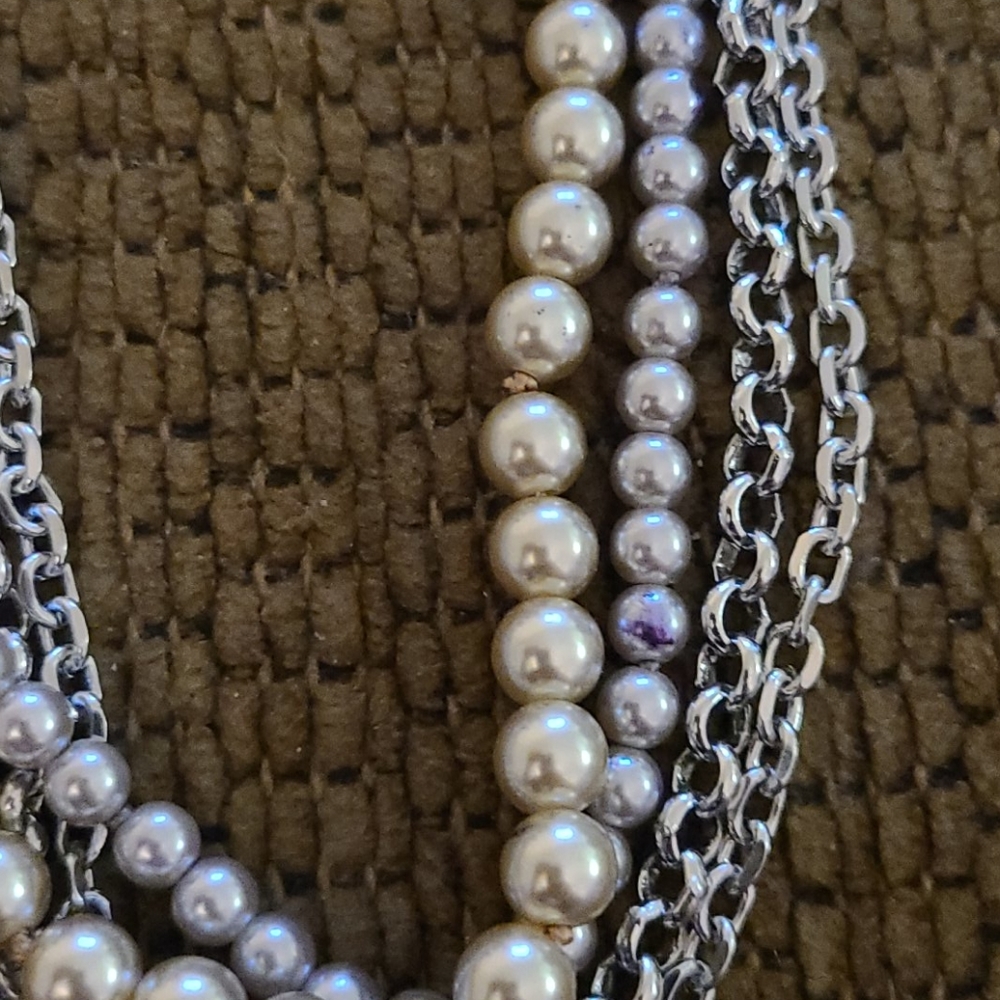 Silver chain and pearl necklace